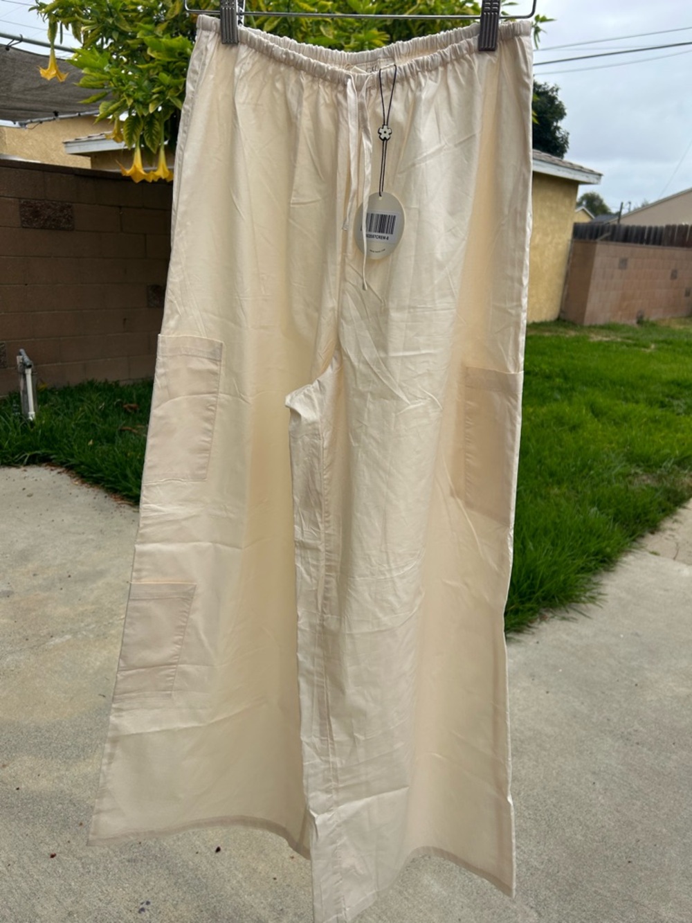 Wide-Leg Drawstring Pants in Cream with Patch Pockets
